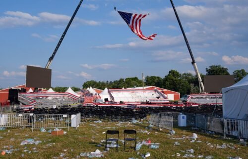 A campaign rally site for former President Donald Trump is empty and littered with debris Saturday
