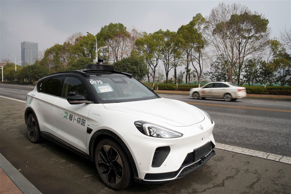 <i>Josh Arslan/Reuters via CNN Newsource</i><br/>Baidu's driverless robotaxi service Apollo Go on the road in Wuhan