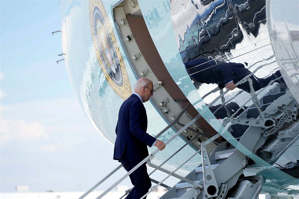<i>Kent Nishimura/AFP/Getty Images via CNN Newsource</i><br/>US President Joe Biden boards Air Force One as he departs Harry Reid International Airport in Las Vegas
