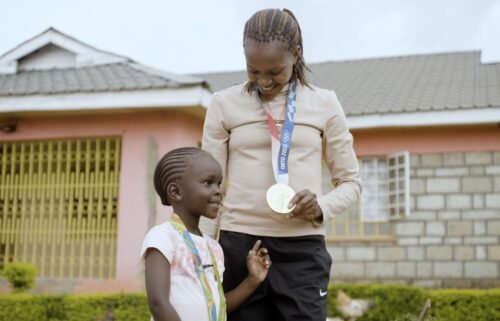Middle-distance runner Faith Kipyegon and her daughter Alyn. The Kenyan Olympian has continued to break records since becoming a mother