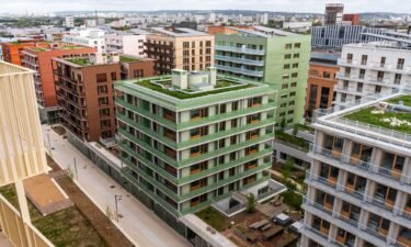 Solar panels and green roofs on the top of athletes' accommodation in the Olympic Village in Saint-Denis