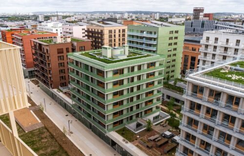 Solar panels and green roofs on the top of athletes' accommodation in the Olympic Village in Saint-Denis