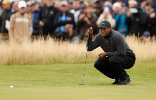 Tiger Woods faces an uphill battle to make the weekend at the Open Championship after toiling to an eight-over 79 during the first round of the major in Scotland