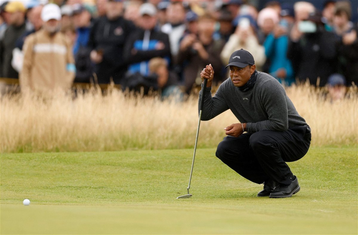 <i>Jason Cairnduff/Reuters via CNN Newsource</i><br/>Tiger Woods faces an uphill battle to make the weekend at the Open Championship after toiling to an eight-over 79 during the first round of the major in Scotland