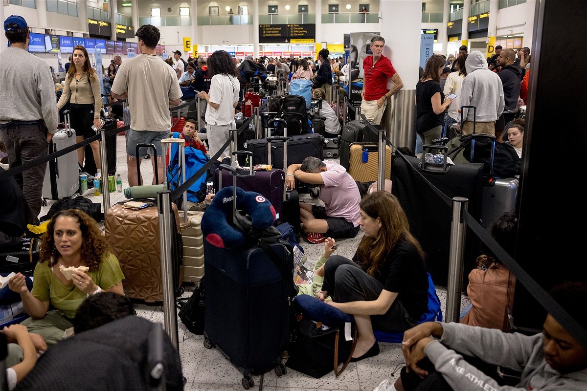 <i>Jack Taylor/Getty Images via CNN Newsource</i><br/>Widespread IT problems are currently impacting global travel. Pictured here: passengers at London's Gatwick Airport amid the disruption.
