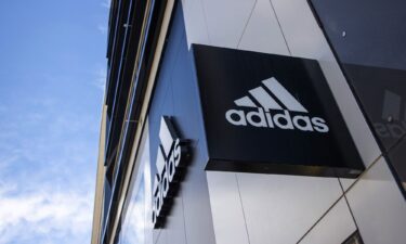 Adidas have apologized for the "distress" caused by its ad campaign.