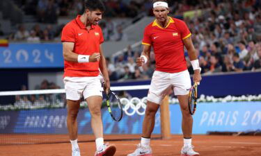 Nadal and Alcaraz celebrate during their competitive doubles debut.