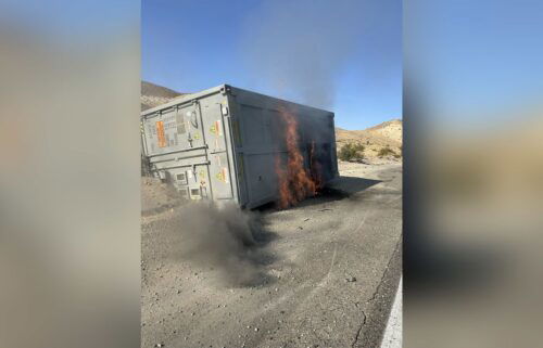 A tractor trailer carrying lithium ion batteries overturned and caught fire on July 26