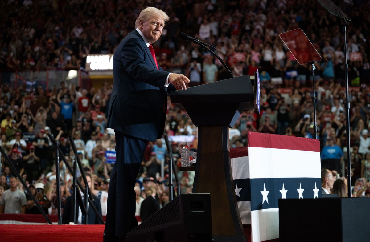 <i>Stephen Maturen/Getty Images via CNN Newsource</i><br/>Former President Donald Trump arrives to speak during a rally at Herb Brooks National Hockey Center on July 27