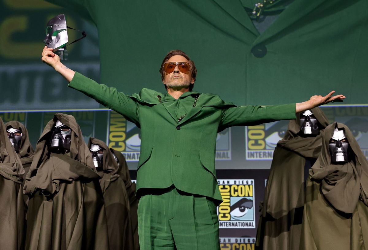 <i>Jesse Grant/Getty Images via CNN Newsource</i><br/>Robert Downey Jr. speaks onstage during the Marvel Studios Panel at SDCC in San Diego