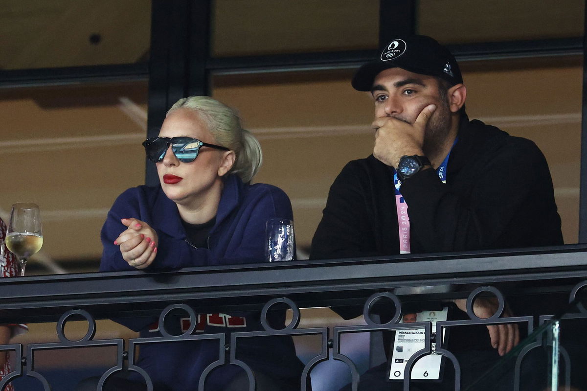 <i>Arturo Holmes/Getty Images via CNN Newsource</i><br/>Lady Gaga and Michael Polanksy watch on July 28 at the women's Artistic Gymnastics qualification round during the 2024 Olympic Games in Paris.