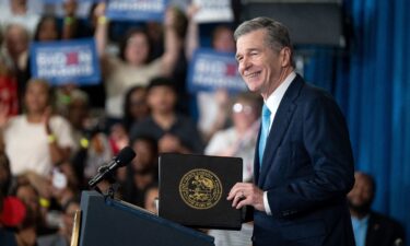 North Carolina Gov. Roy Cooper speaks at a Biden Harris campaign event at James B. Dudley High School on July 11