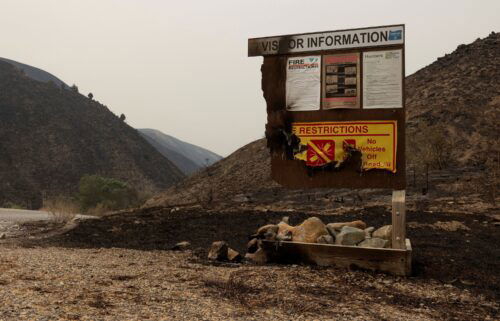 A damaged visitor sign is pictured near the Durkee Fire in Oregon.