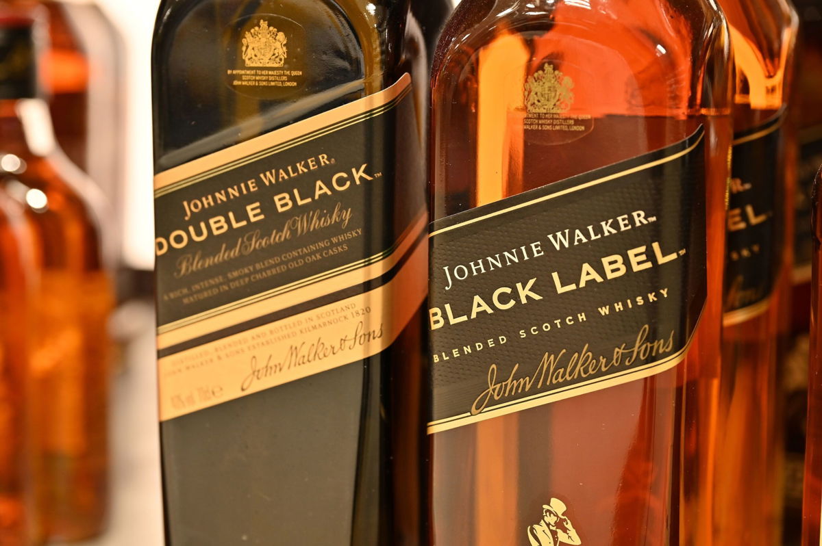 <i>John Keeble/Getty Images via CNN Newsource</i><br/>Bottles of Johnnie Walker Black Label and Double Black blended scotch whisky are displayed for sale in January in Leigh on Sea