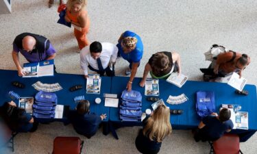 Job seekers attend the South Florida Job Fair on June 26 in Sunrise