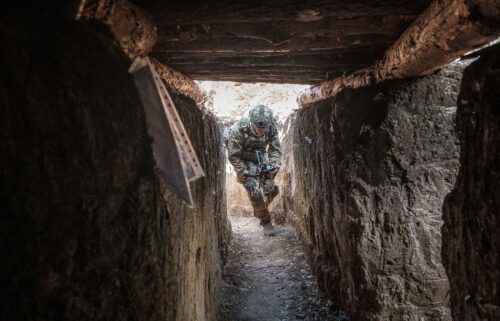 A Ukrainian soldier runs to a shelter in the Pokrovsk area of Ukraine on July 23.