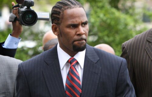 R. Kelly arrives at the Cook County Criminal Courts Building for his child pornography trial on May 20