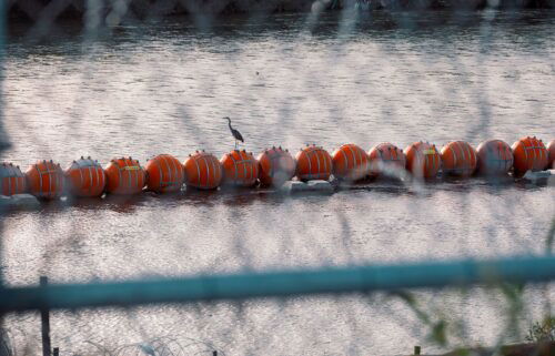 Buoys meant to deter migrant crossings in the Rio Grande River in Eagle Pass