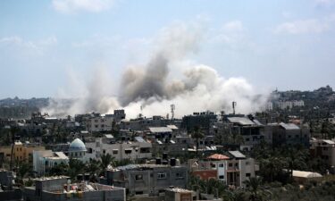 Smoke rises during an Israeli strike in Deir el-Balah in the central Gaza Strip on July 27.