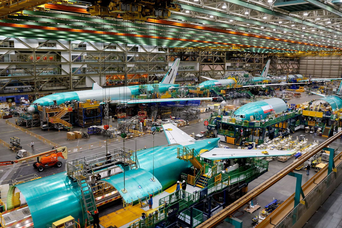 <i>Jennifer Buchanan/Pool/AFP/Getty Images via CNN Newsource</i><br/>Boeing 777 freighters and 777X under construction at its Washington state factory.