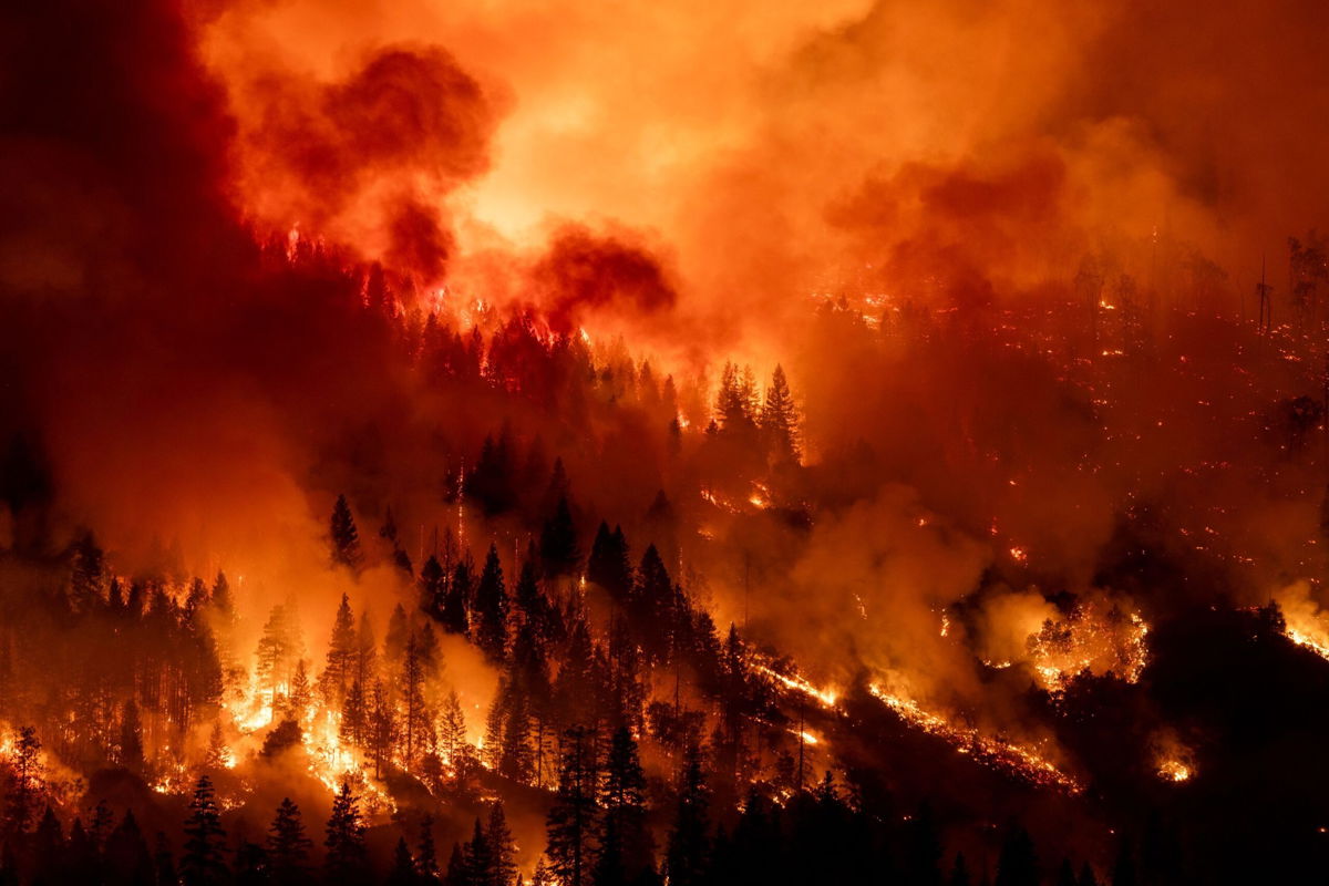 <i>David McNew/Getty Images via CNN Newsource</i><br/>Hundreds of homes are evacuated due to wildfire near Denver as California’s Park Fire torches an area larger than Los Angeles.