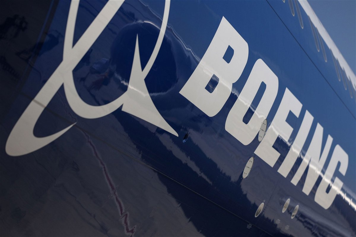 <i>Christopher Pike/Bloomberg/Getty Images via CNN Newsource</i><br/>A logo on the body of a Boeing Co. 777-9 passenger aircraft at the Dubai Air Show in Dubai