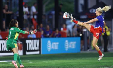 Lindsey Horan of the United States shoots as Noelia Bermúdez of Costa Rica defends during the first half at Audi Field on July 16