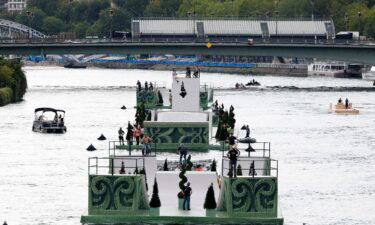 Boats and cast members rehearse on the River Seine for the Opening Ceremony of Paris 2024 Olympic Games on July 24.