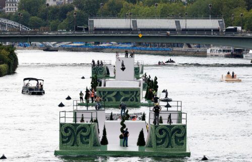 Boats and cast members rehearse on the River Seine for the Opening Ceremony of Paris 2024 Olympic Games on July 24.