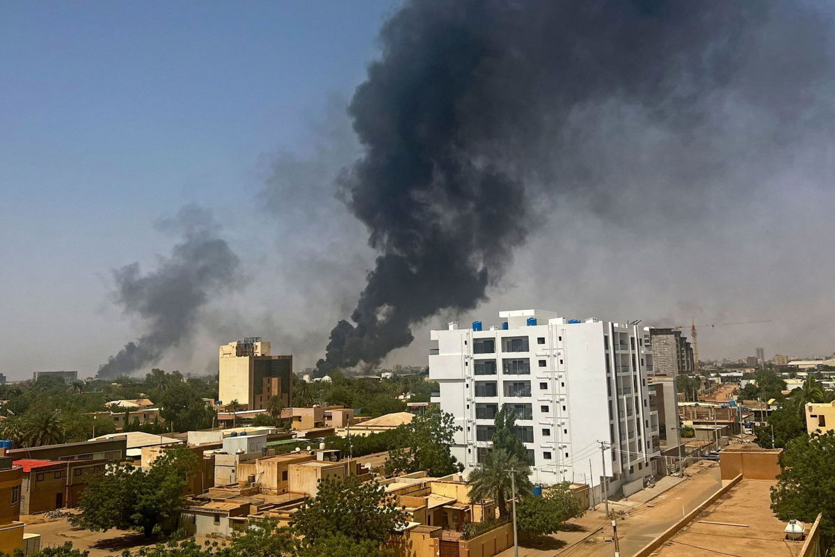 <i>AFP via Getty Images via CNN Newsource</i><br/>Smoke billows above residential buildings in Khartoum
