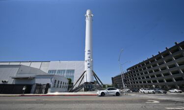 A Falcon 9 first-stage booster is seen on display at SpaceX headquarters in Hawthorne