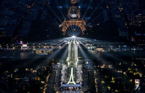 The Eiffel Tower and the Olympics rings are lit up during the opening ceremony for the 2024 Summer Olympics in Paris