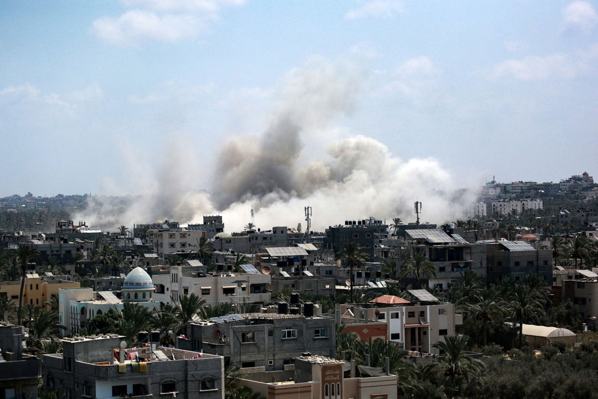 <i>Bashar Taleb/AFP/Getty Images via CNN Newsource</i><br/>Smoke rises during an Israeli strike in Deir el-Balah in the central Gaza Strip on July 27