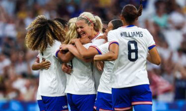 US players celebrate Korbin Albert's goal against Australia.