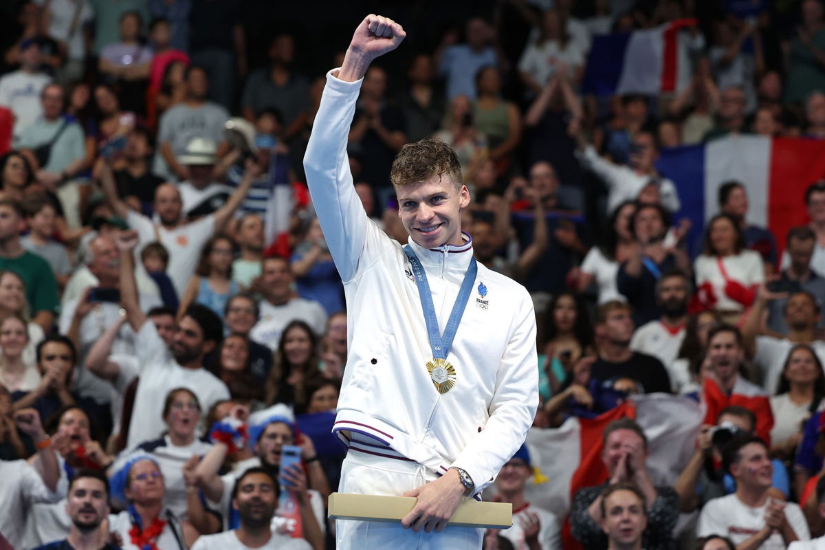 <i>Quinn Rooney/Getty Images via CNN Newsource</i><br/>Leon Marchand astounded the partisan crowd in Nanterre by winning two gold medals and breaking two Olympic records in one night.