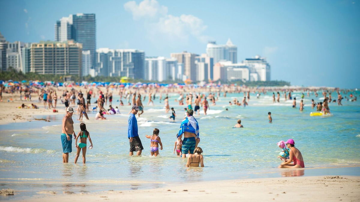 <i>lazyllama/Adobe Stock via CNN Newsource</i><br/>Crowds flock to the sea and sand of South Beach in Miami. Florida is No. 5 in drowning deaths per 100