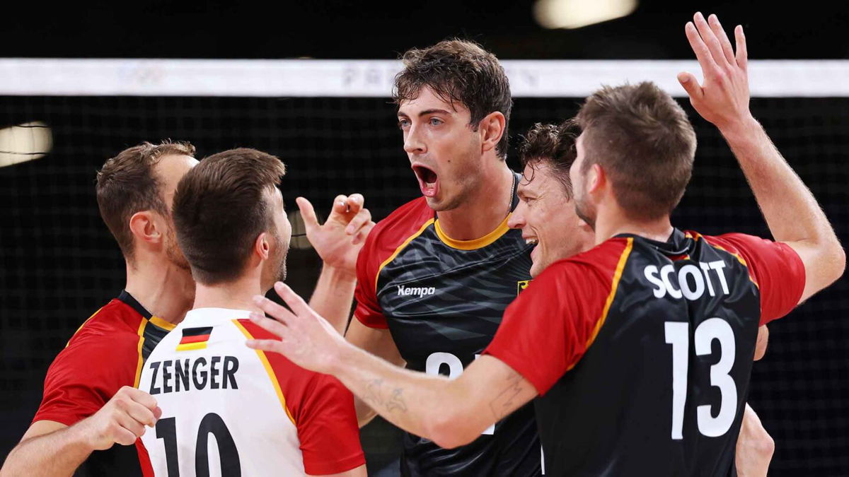 Team Germany celebrate a point during the Men's Preliminary Round - Pool C match between Japan and Germany on day one of the Olympic Games Paris 2024 at South Paris Arena on July 27