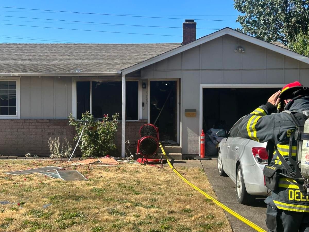 <i>KEZI via CNN Newsource</i><br/>Fire officials said that the fire was contained to one side of the duplex and that two individuals were rescued from the dwelling.