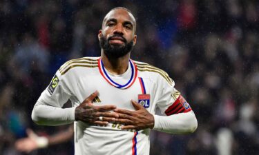 Alexandre Lacazette looks at the fans