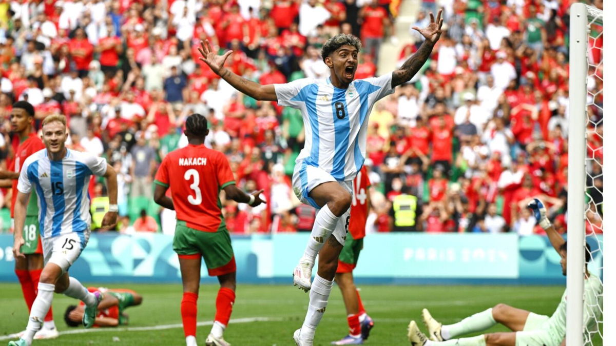 Argentina player celebrates after scoring a goal.