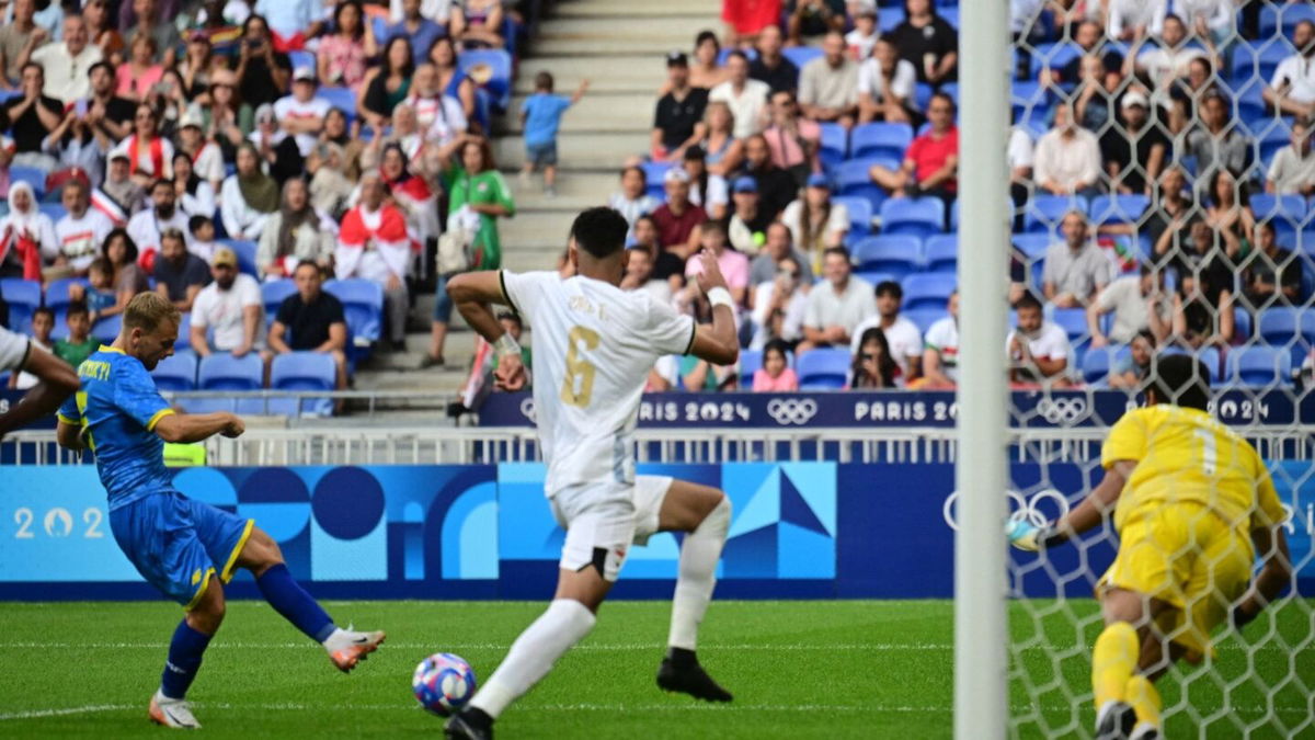 Ukraine player celebrates after scoring a goal.