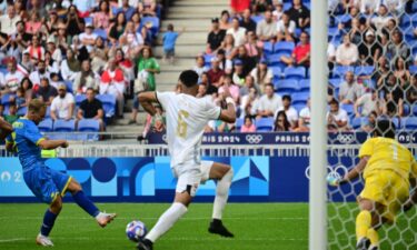 Ukraine player celebrates after scoring a goal.