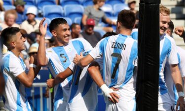 Argentina players celebrate after scoring a goal.