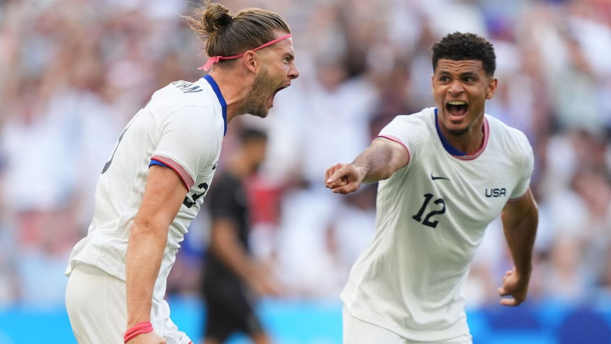 USA players celebrate after scoring a goal