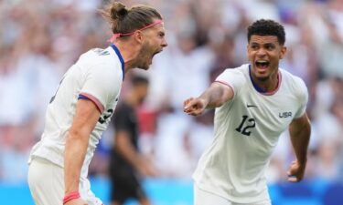 USA players celebrate after scoring a goal