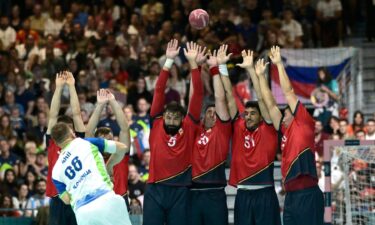 Spanish defends move to block a shot by Slovenia