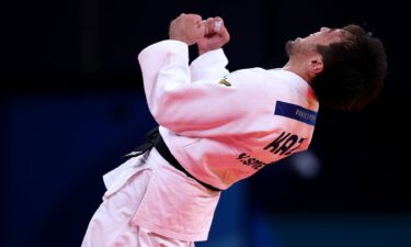 Yeldos Smetov celebrates his 60kg gold medal