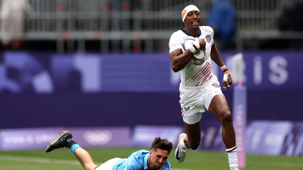 Perry Baker scores a try against Uruguay