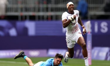 Perry Baker scores a try against Uruguay