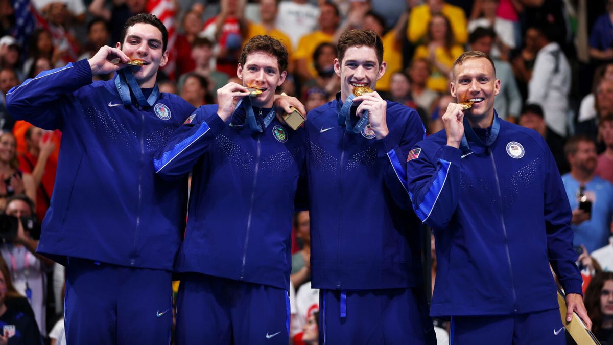 Men's free relay swimmers receive Team USA's 1st Paris gold